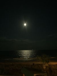 Scenic view of sea at night