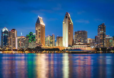 San diego california skyline at night with reflections in water