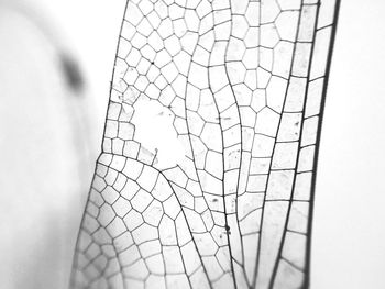 Close-up of metallic structure against sky