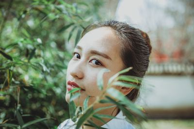 Close-up portrait of young woman