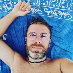 Portrait of man lying down