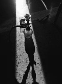 High angle view of woman shadow on street