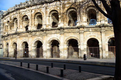 Group of people in front of historical building