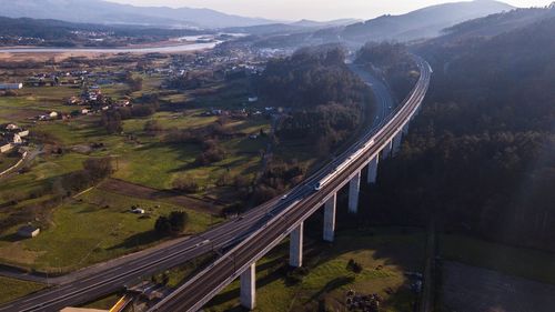 High angle view of vehicles on road in city