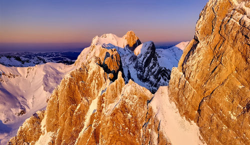 Panoramic view of  snow mountains  with sunset, nordic islands,greenland,faroer,iceland 