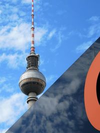 Low angle view of fernsehturm against sky