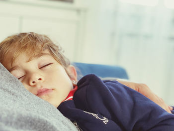 Portrait of boy sleeping at home