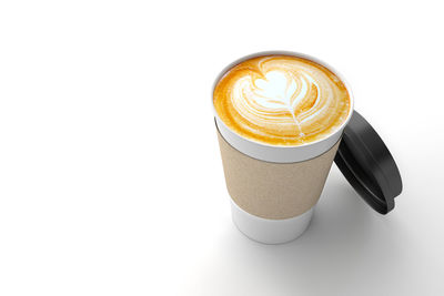 Close-up of coffee cup against white background