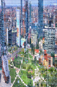 Digital composite image of modern buildings in city