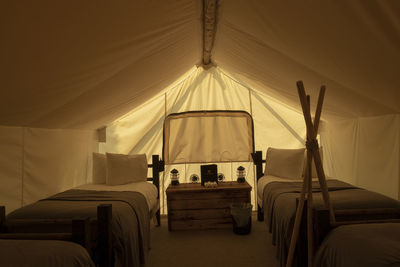 Beds arranged in tent
