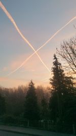 Scenic view of vapor trails against sky