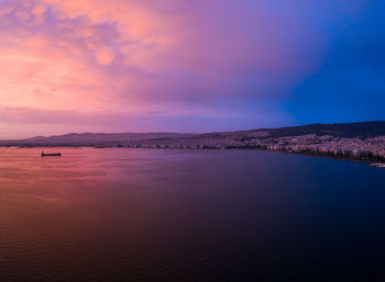 Scenic view of sea against sky at sunset