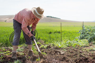 Man working on field