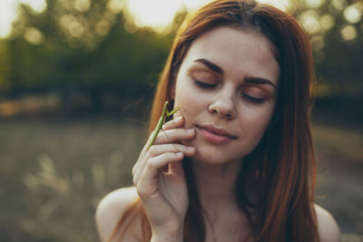 Close-up portrait of beautiful young woman