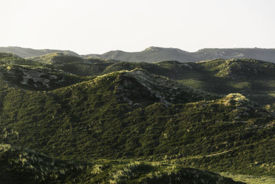 Scenic view of mountains against clear sky