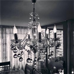 Illuminated chandelier at home