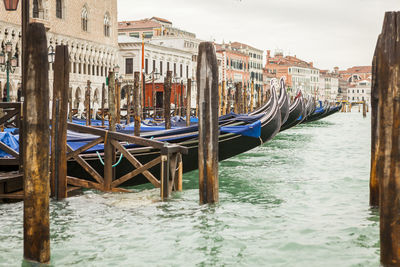 Boats moored at dock