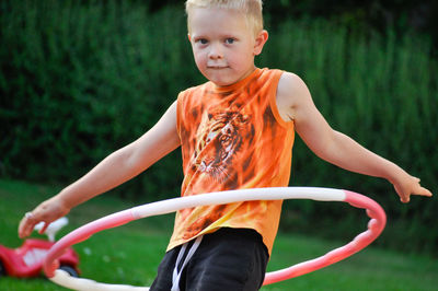 Full length of boy standing outdoors