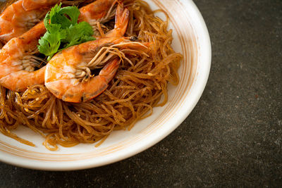 Close-up of noodles in plate on table