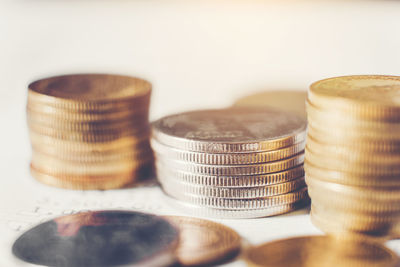 Close-up of coins on table