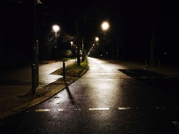 Illuminated street at night