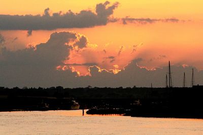 Scenic view of dramatic sky at sunset