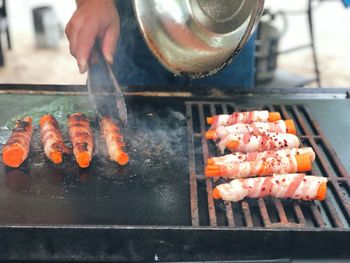 Close-up of meat cooking on barbecue grill