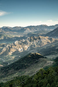 Scenics of mountains against blue sky