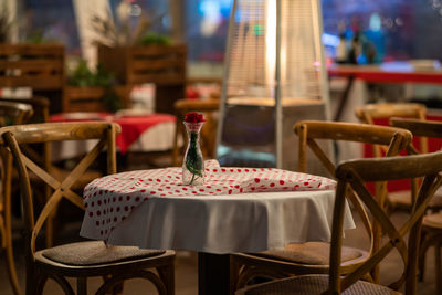 Empty chairs and table in cafe