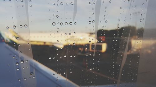 Full frame shot of raindrops on glass window