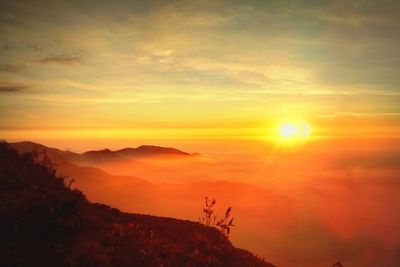 Scenic view of landscape against sky during sunset