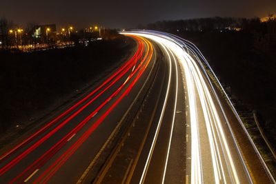 Light trails on road at night