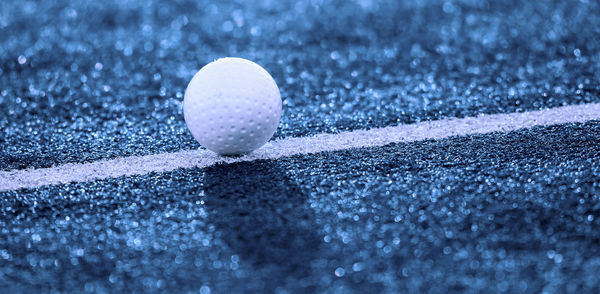 Close-up of ball on grassland