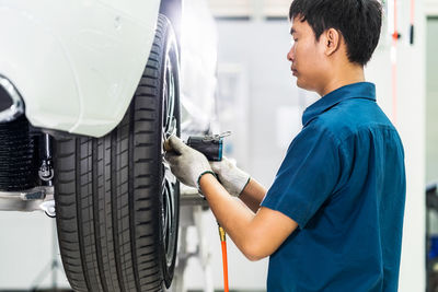 Man working in car