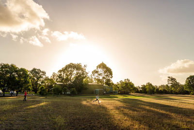 Men in park against sky