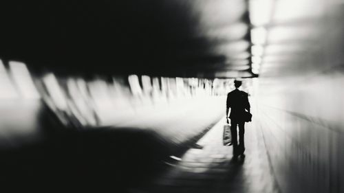 Silhouette man in bicycle