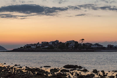 Scenic view of sea against sky during sunset