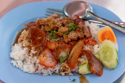 Red pork rice, asian street food, available 24 hours a day.