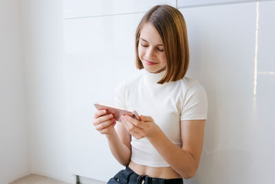 Young woman using mobile phone