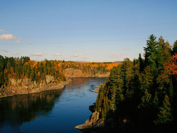 Scenic view of lake against sky during autumn