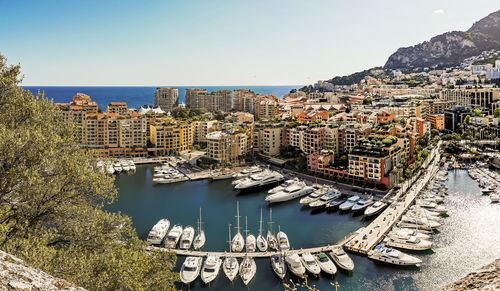 Panoramic view of sea and buildings against clear sky