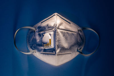 High angle view of blue glass on table