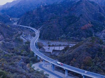 High angle view of bridge and mountains