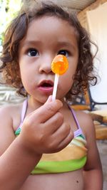 Portrait of cute boy eating food