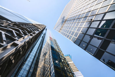 Low angle view of modern buildings against clear sky