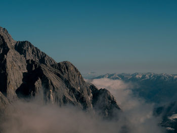 Scenic view of mountains against clear sky