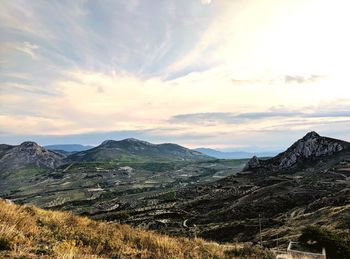 Scenic view of landscape against sky during sunset