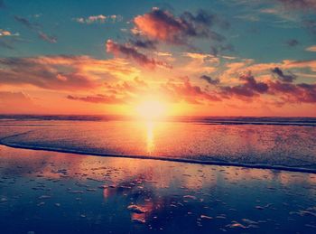 Scenic view of sea at sunset