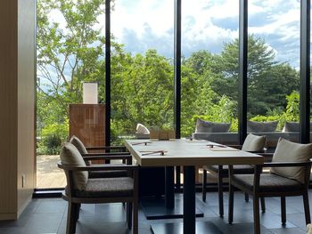 Empty chairs and table in restaurant