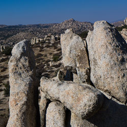 Stone wall against clear sky